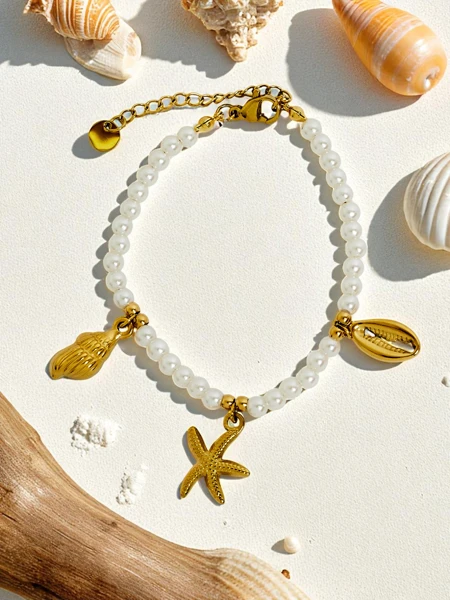 Браслет Poseidon Mare Stella с морскими мотивами и жемчужинами