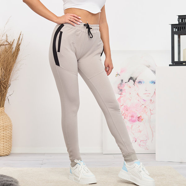 Женские светло-серые спортивные штаны со вставками- Одежда