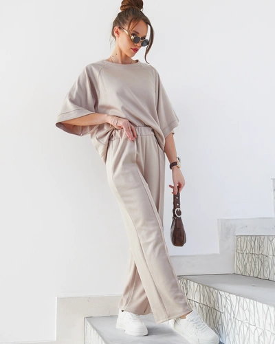 Royalfashion Жіночий комплект з короткими рукавами та розкльошеними штанами