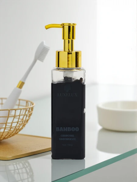 LUXELUX Отбеливающая зубная паста с таурином и активированным углем