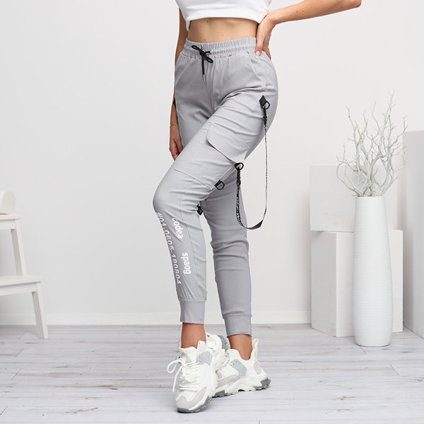 Сірі жіночі штани з написами